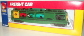 AN LIFE LIKE CAR CARRIER WITH CARS